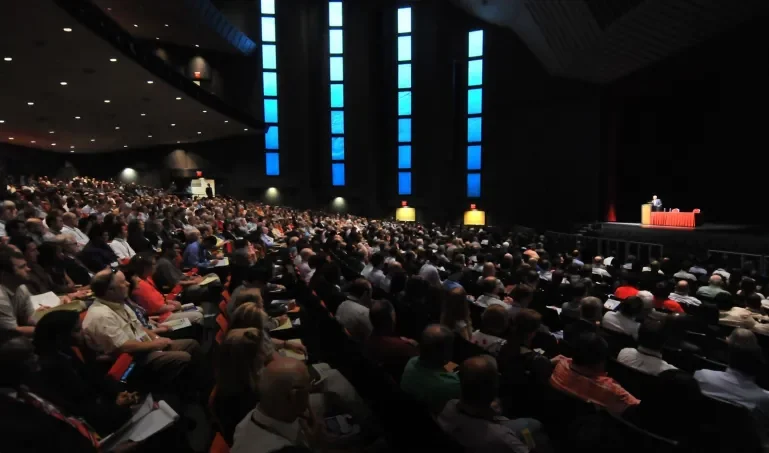 Speaker presenting to an audience